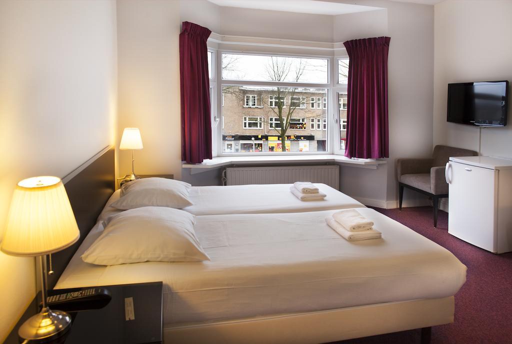 Economy Hotel Utrecht Habitación foto