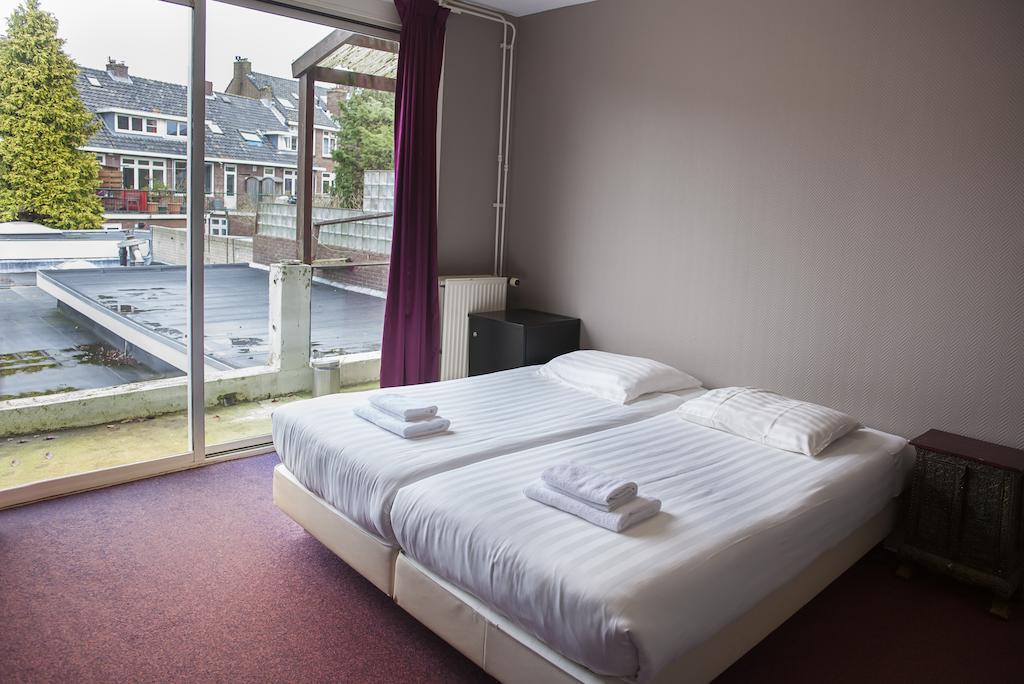 Economy Hotel Utrecht Habitación foto